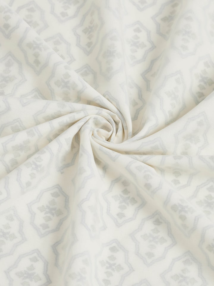 Aarunya blue trellis cotton Sanganeri block printed double dohar arranged to showcase the intricate block print design.