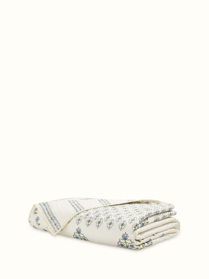 Full view of Aarunya Blue Floral Cotton Sanganeri Block Printed Double Quilt showcasing the floral design.