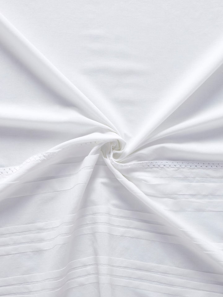 Nityam white solid cotton linen Sanganeri block printed sheer curtain (7 ft), close-up of the curtain’s top with its hanging mechanism.