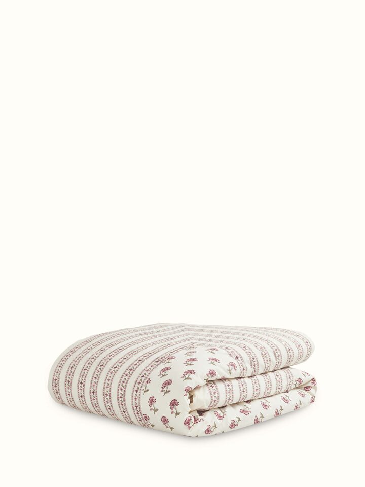 Angled view of Aarunya Red Floral Cotton Sanganeri Block Printed Queen Duvet Cover emphasizing the depth of the floral block print and fabric quality.
