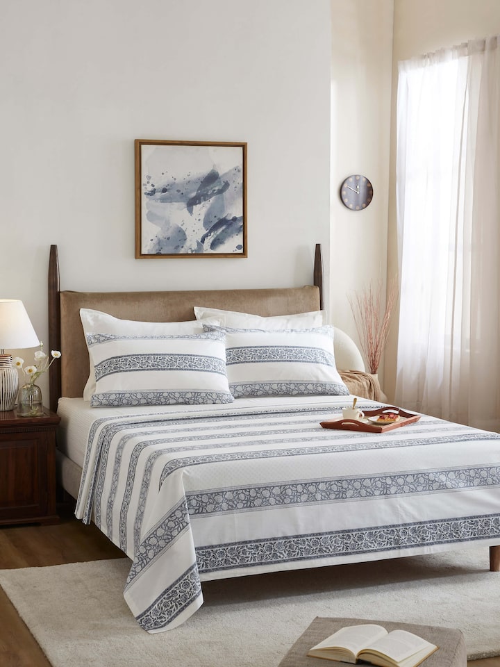 Side view of Saha Grey Floral Cotton Sanganeri Block Printed King Bedsheet Set (3 pcs) highlighting the grey floral print and fabric texture.