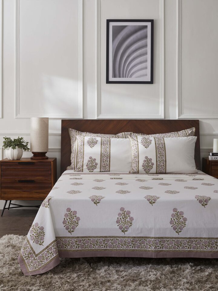 Close-up view of the lavender buta cotton Sanganeri block printed queen bedsheet set showing the detailed block print and texture