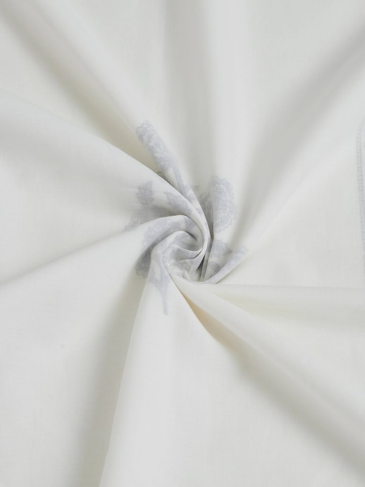 Angled view of grey jaal cotton Sanganeri block printed double dohar, focusing on the intricate design and the comfortable feel of the cotton material.