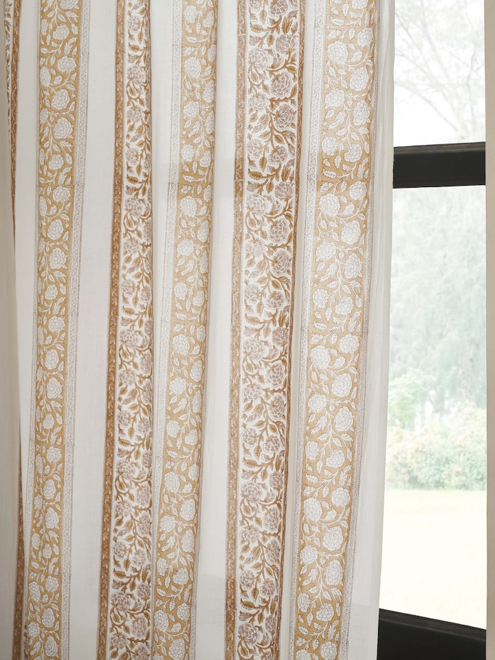 Perspective view of Saha brown floral stripe cotton Sanganeri block printed sheer curtain (9 ft) illustrating its length and design pattern.