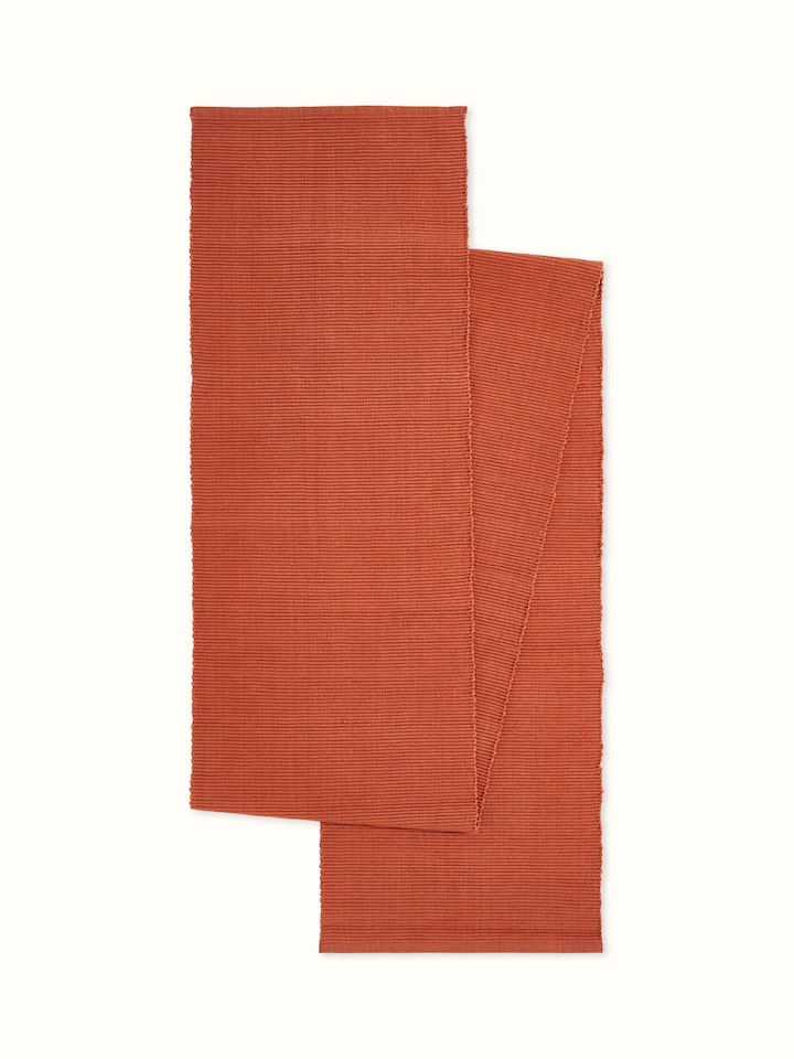 Full front view of Vastav Rust Solid Cotton Table Runner, designed for 6-seater dining tables.