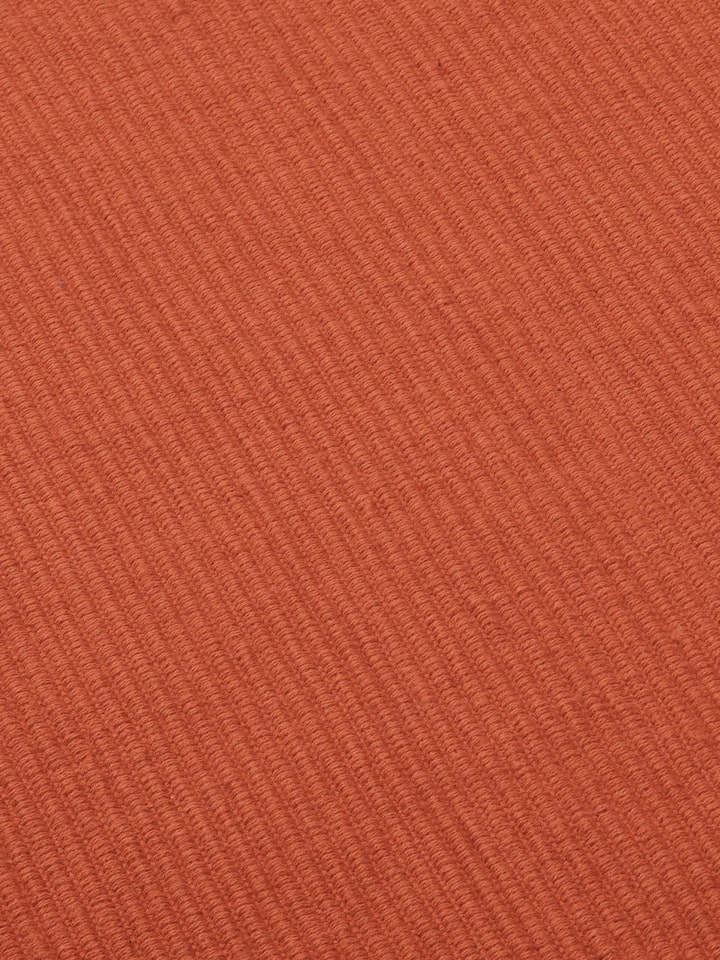 Side view of Vastav Table Runner fabric, emphasizing thickness and neat hem.