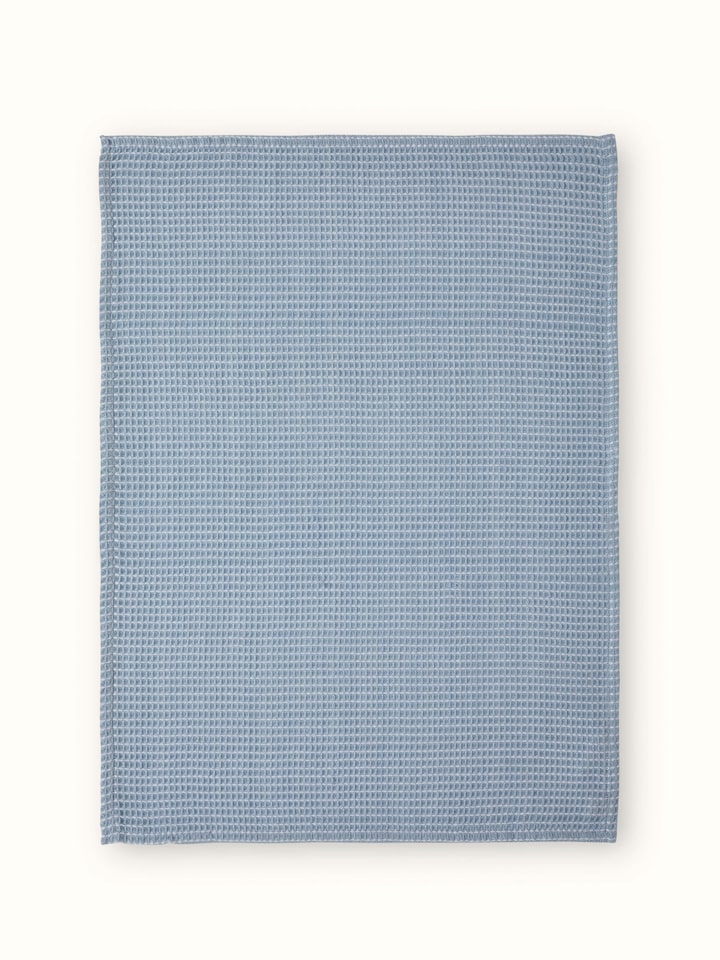 Close-up of Arth Light Blue Waffle Cotton Dish Towels (4 pcs) - Detailed view of waffle texture and light blue hue.