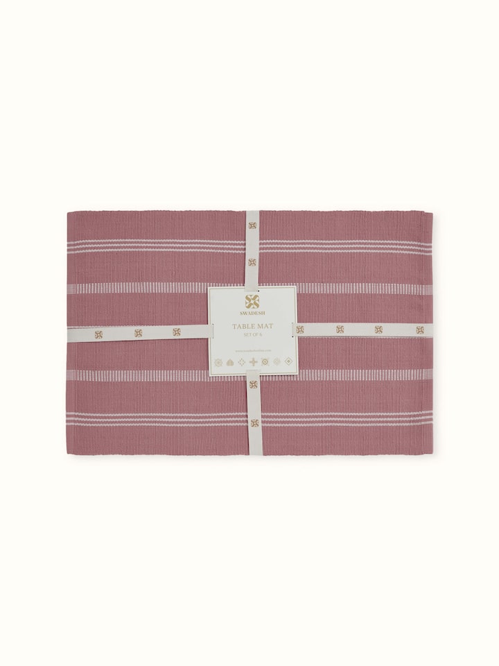 Close-up showing stripe detail and weave of Vastav pink cotton table mat