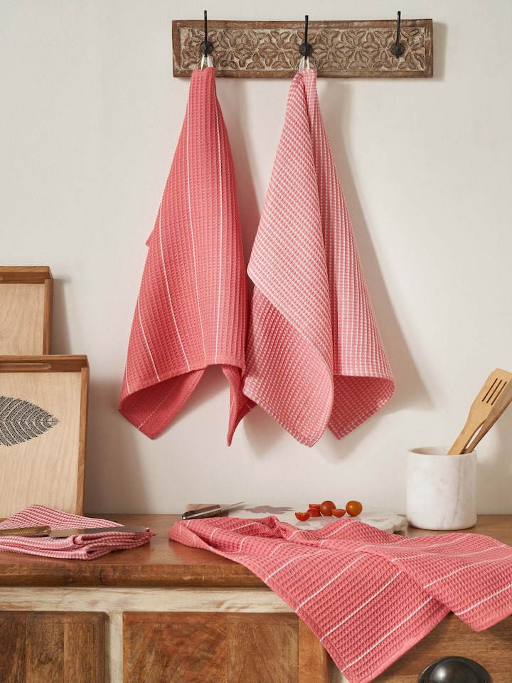 Close-up of Arth pink handwoven cotton dish towels (4 pcs) highlighting the handwoven pattern and soft cotton fabric.