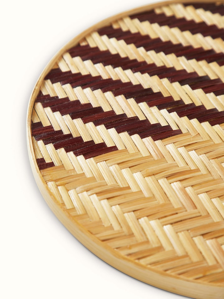 Naveena brown geometric round natural fibre trivet (2 pcs), showing the set of two trivets arranged together