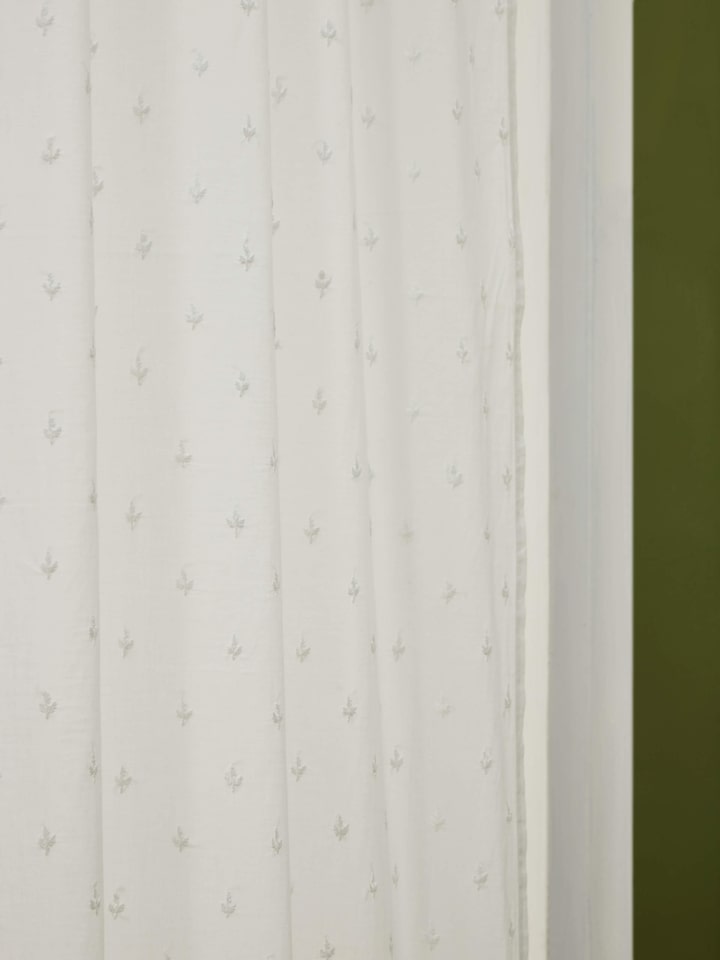 Close-up of Svetah White Trellis Silk Cotton Chikankari Sheer Curtain focusing on the texture and fabric quality.