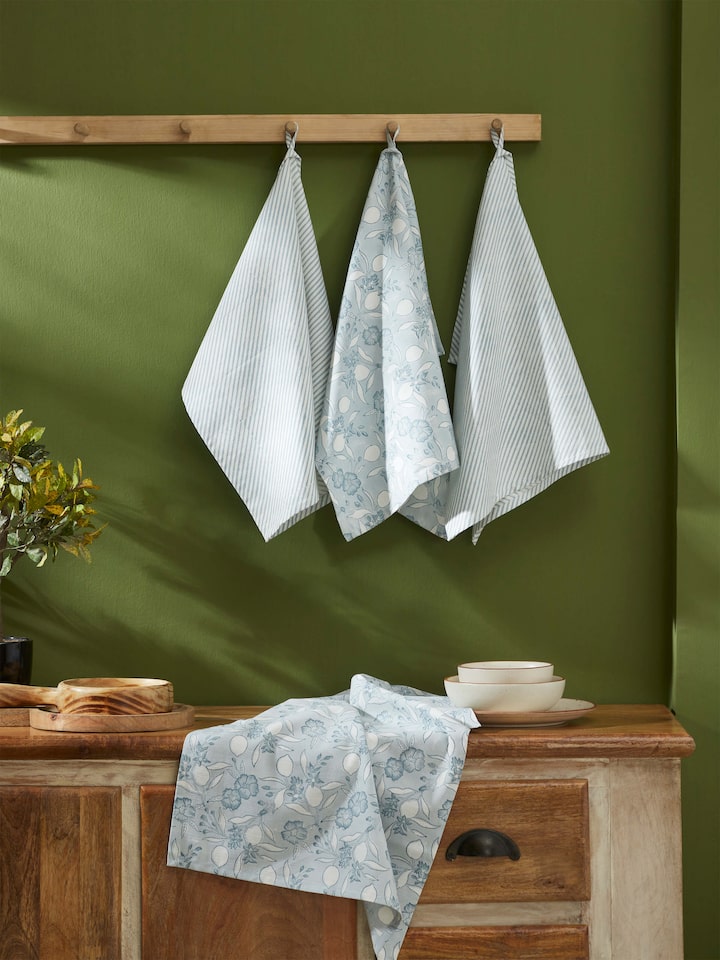 Close-up of the light blue floral Sanganeri block printed dish towels showing detailed design