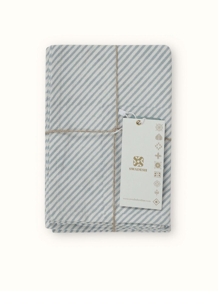 Dish towels in light blue with Sanganeri block floral print, highlighting the intricate design