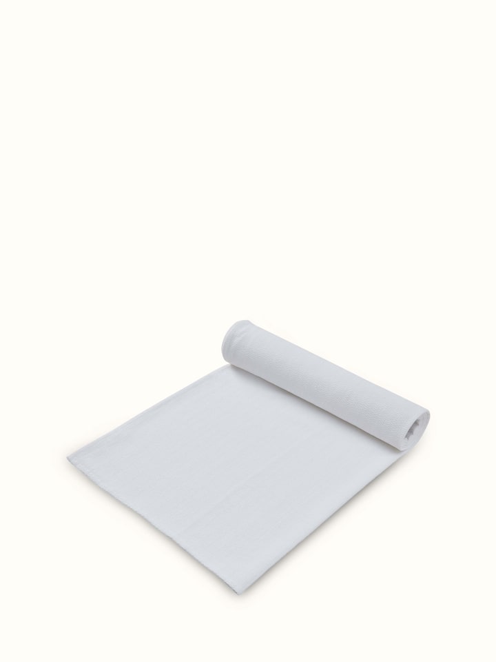 Side view of Vayana stripe white cotton bath towel (XL) displaying its stripe pattern and overall size.