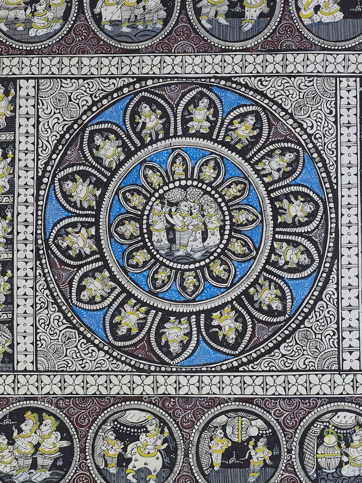 Close-up of Pattachitra Krishna narrative painting highlighting the detailed artwork and storytelling elements.