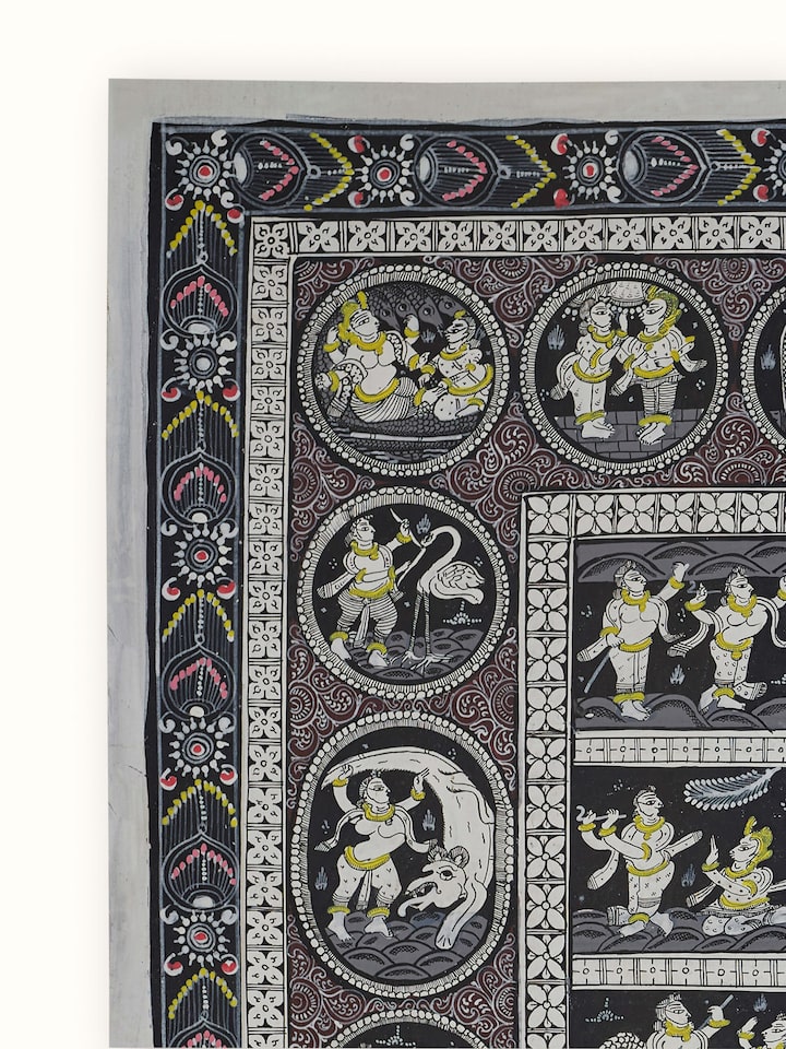 Side view of Pattachitra Krishna narrative painting showing the intricate patterns and rich colors.