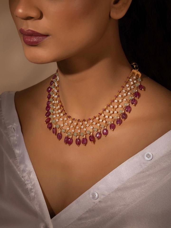 Styled detail view of Gemstone Strings Silver Collar Necklace worn on the finger, shown in an alternate styled shot