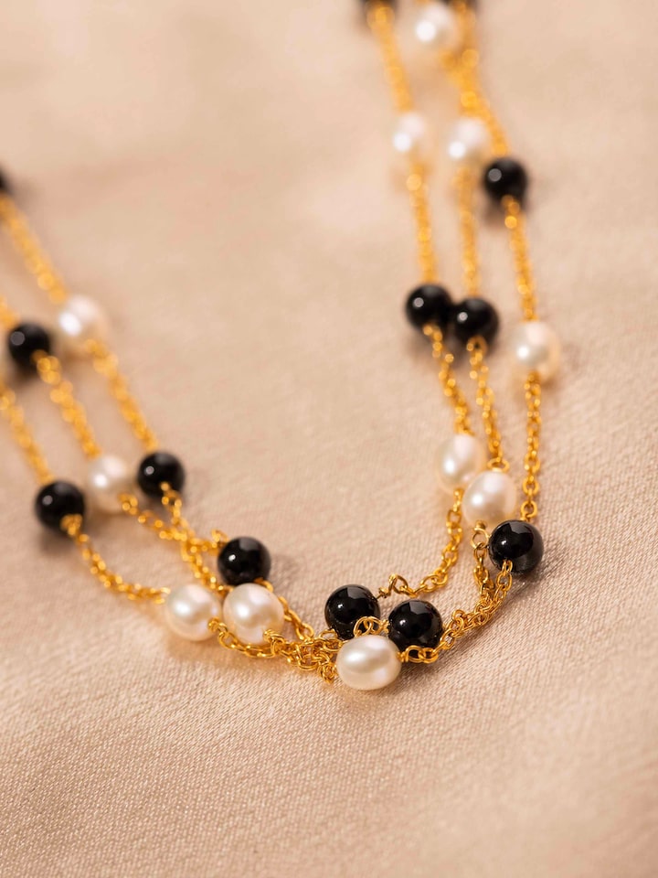 Detail view of Gemstone Strings Silver Long Necklace highlighting the stone setting and metalwork detail