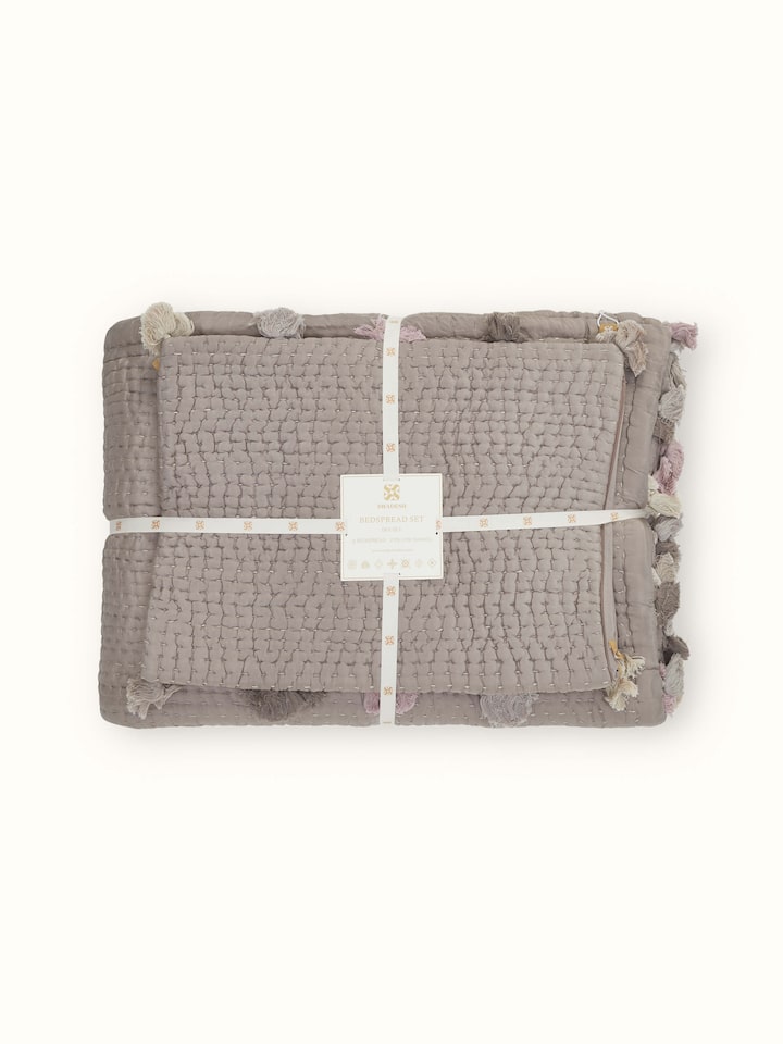 Detailed view of brown textured silk razai embroidered double bedspread set, highlighting the craftsmanship and design elegance.