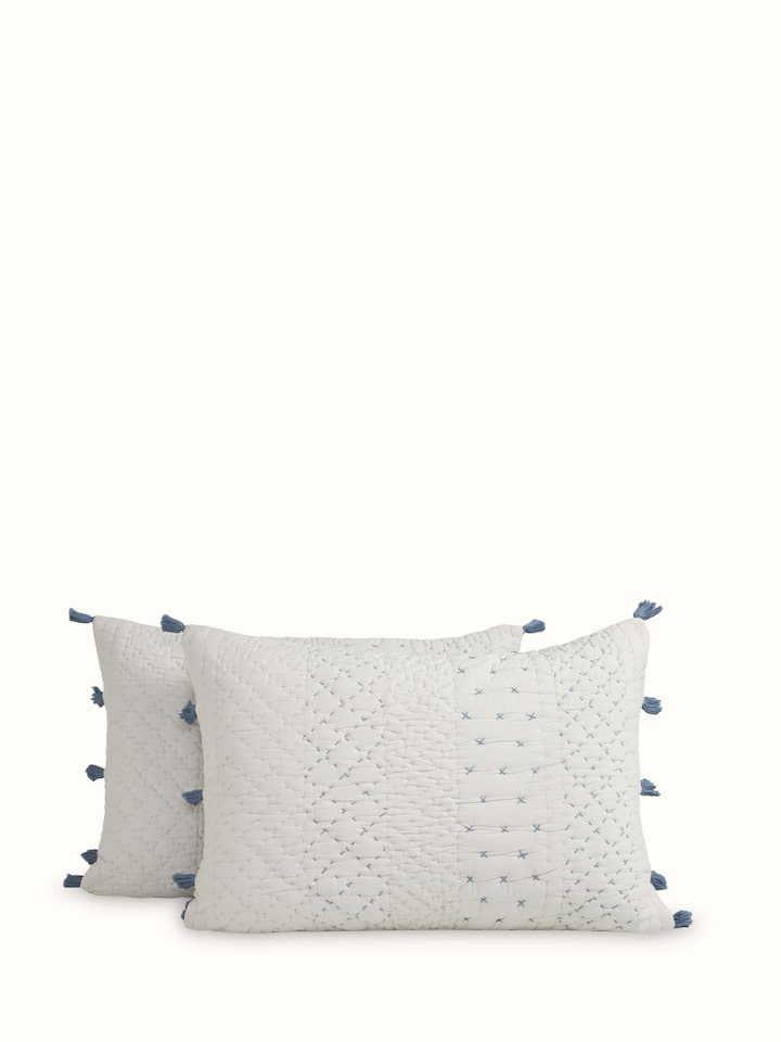 Close-up of Nitya Blue Textured Stripe Cotton Razai Embroidered Double Bedspread Set highlighting the intricate embroidery.