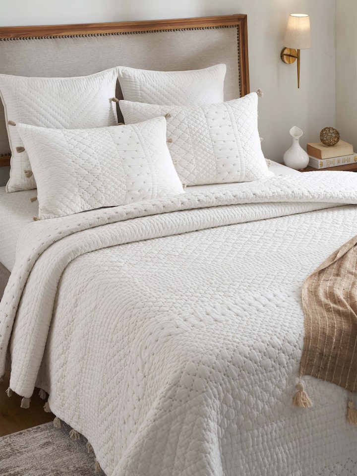 Close-up of Nitya off-white textured stripe cotton razai embroidered double bedspread set showing the detailed embroidery and stripe pattern