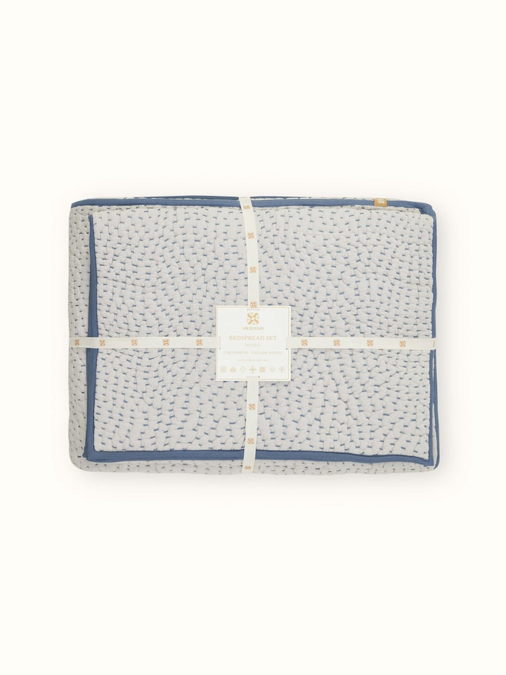 Close-up view of the double bedspread set, focusing on the two-tone texture and fine embroidery details.