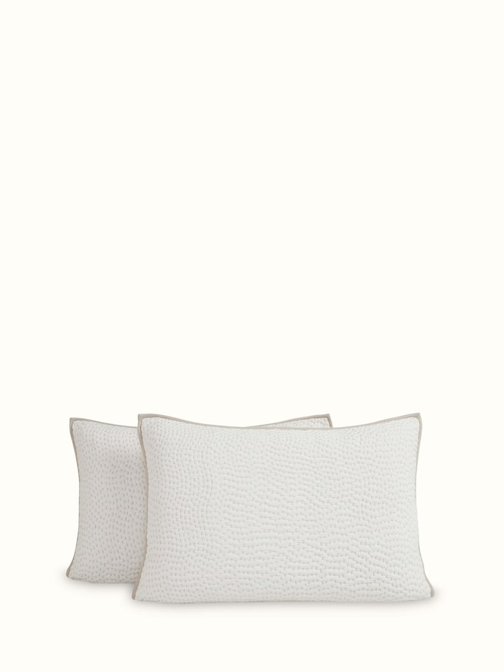 Angle view of Nityam Ivory Two-Tone Textured Cotton Razai Embroidered Double Bedspread Set showing the set’s layout.