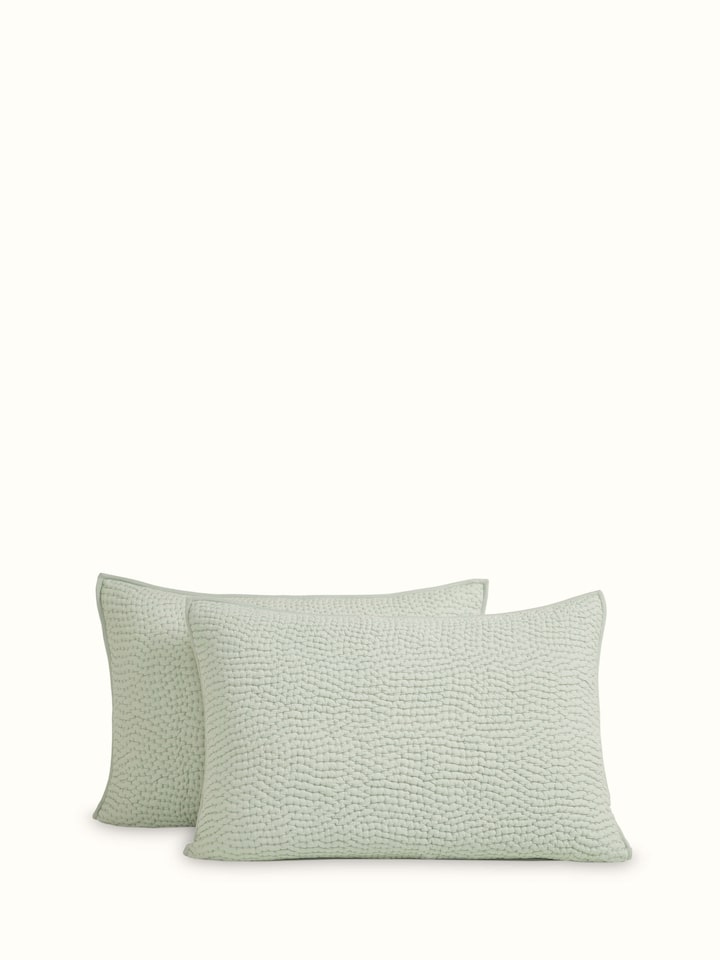 Overhead view of Nityam Light Green Two-Tone Textured Cotton Razai Embroidered Double Bedspread Set, displaying the full design and color.