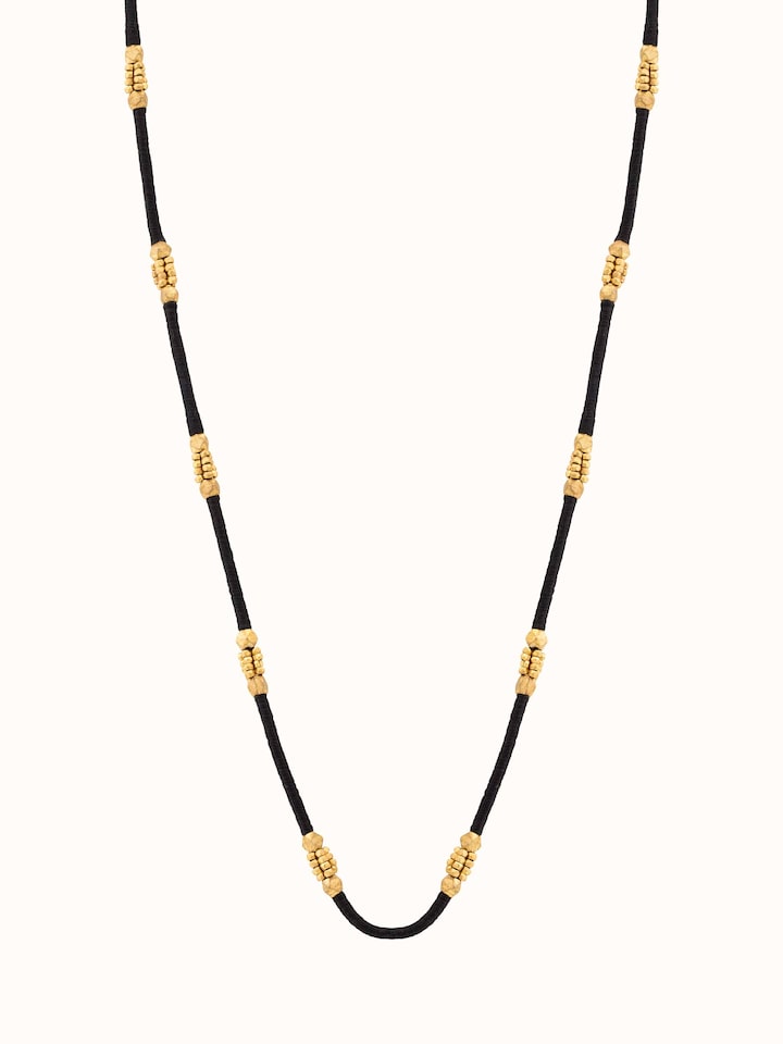 Front view of Dhokra Long Necklace featuring intricate metalwork designs