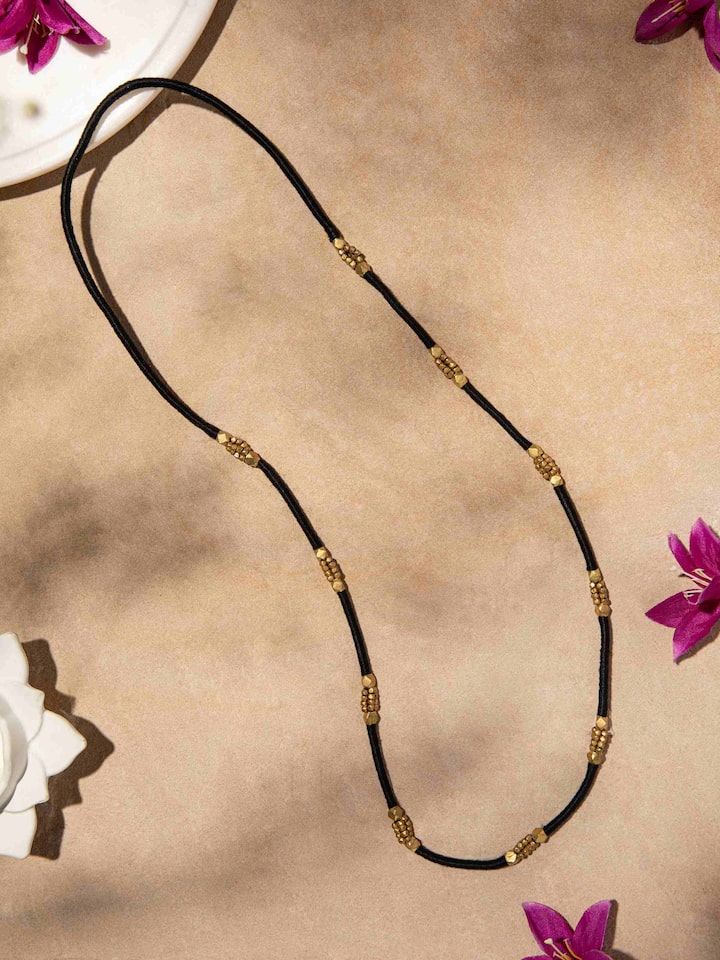 Close-up of Dhokra Long Necklace highlighting detailed craftsmanship