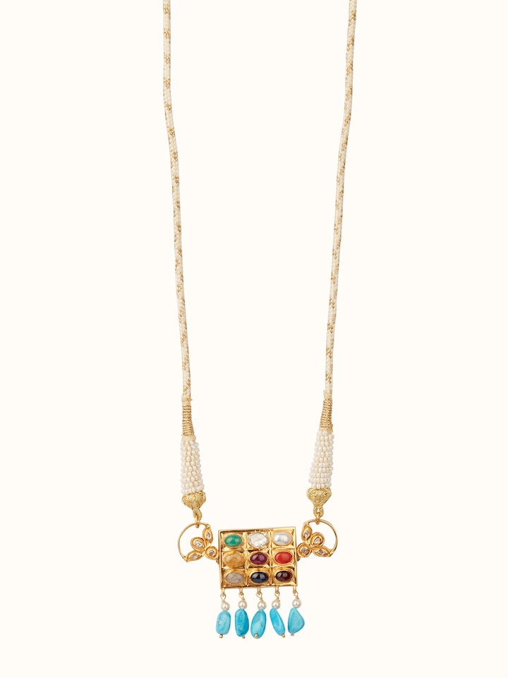 Front view of Navratna Silver Choker displaying vibrant gemstones and detailed silver craftsmanship.