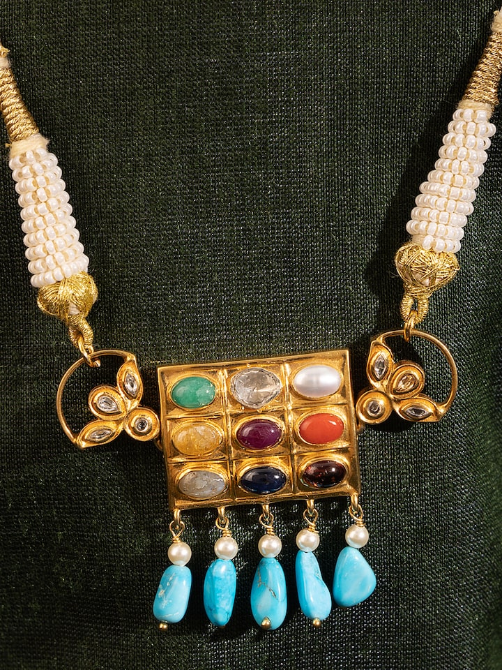 Side view of Navratna Silver Choker highlighting the elegant arrangement of gemstones and sleek design.