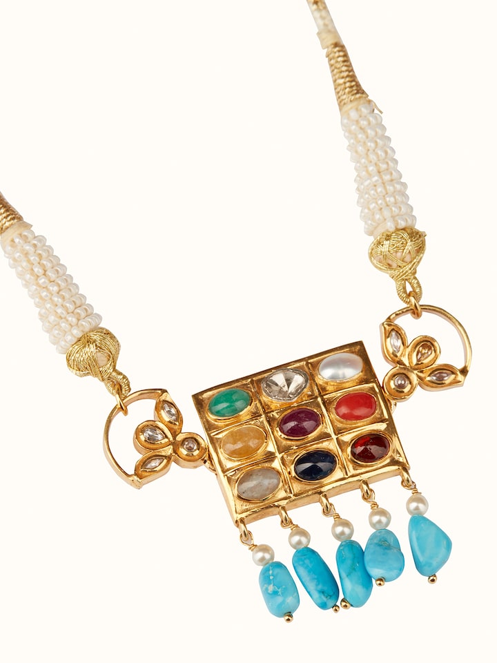 Close-up view of Navratna Silver Choker showcasing intricate silver work and vibrant gemstones.