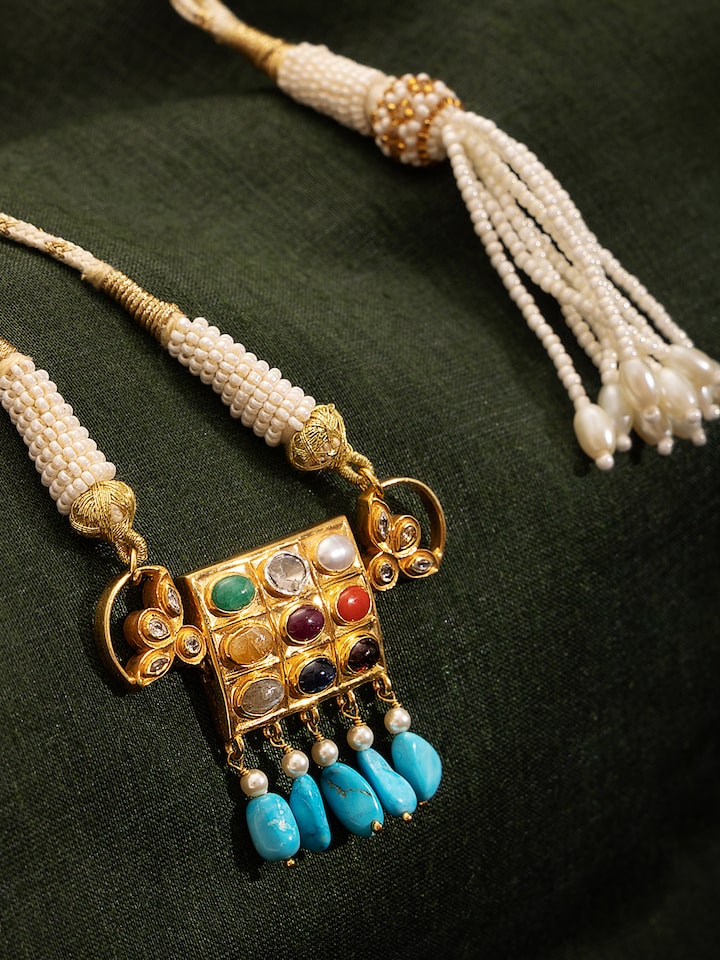 Detailed view of Navratna Silver Choker emphasizing the fine detailing and artistic gemstone arrangement.