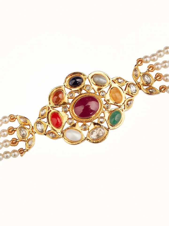 Angled view of Navratna silver choker emphasizing traditional gemstone inlay