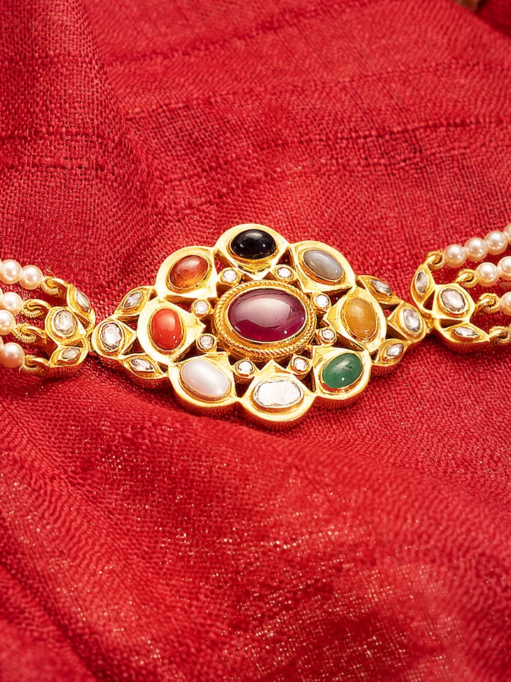 Detailed view of Navratna silver choker highlighting artisan craftsmanship and classic motifs