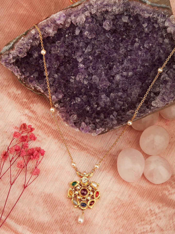 Close-up of Navratna Silver Pendant & Chain highlighting the vibrant gemstones and intricate pendant details.