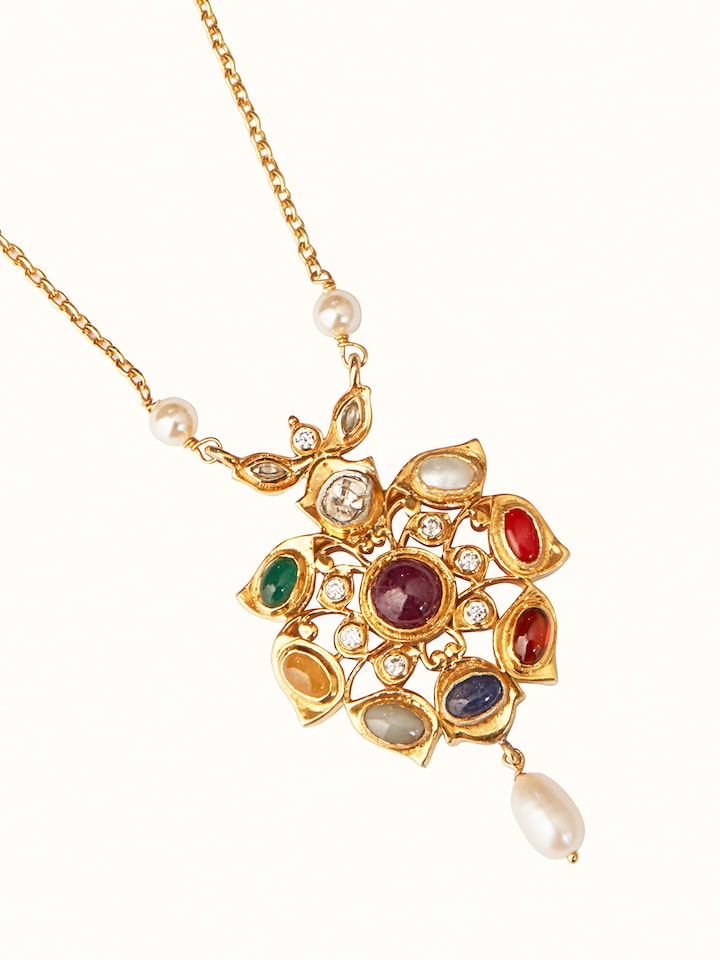 Side view of Navratna Silver Pendant & Chain showcasing the design and arrangement of gemstones.