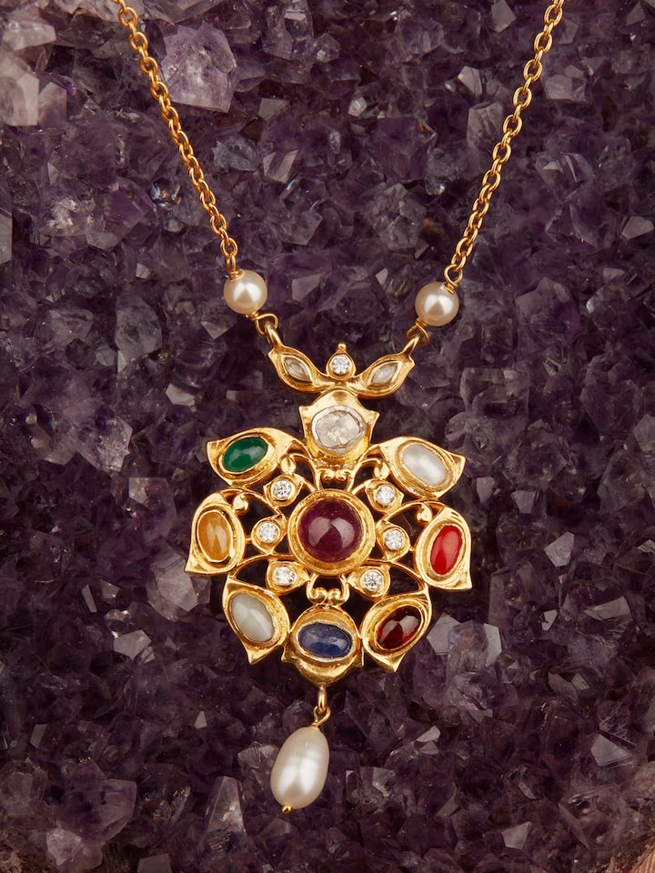 Detailed view of Navratna Silver Pendant & Chain focusing on the gemstone settings and silver finish.