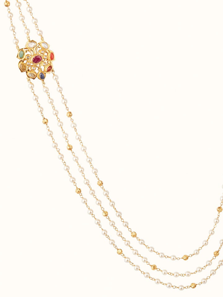 Close-up of Navratna silver pendant & chain emphasizing gemstone details