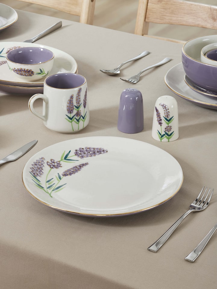 Side view of Khurja pottery stoneware dinner plates (4 pcs) highlighting detailed patterns and durable design.