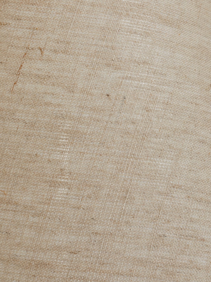 Close-up view of Wood & cotton fabric table lamp