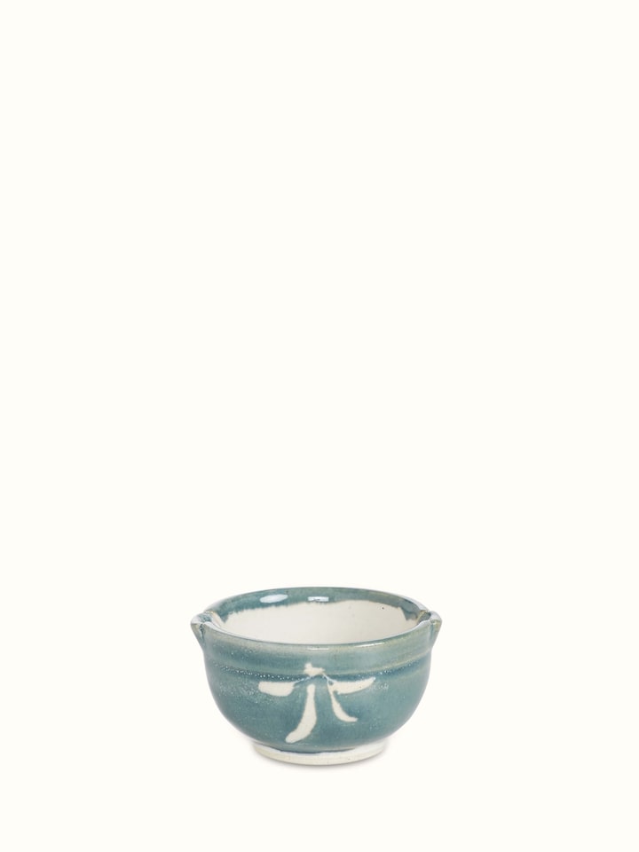 Side view of Khurja Pottery Ceramic Salad Plates in white & green (4 pcs) highlighting their shape and design.