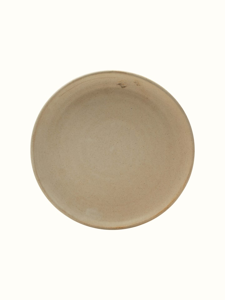 Close-up detail of Studio Pottery Ceramic Dinner Plate Beige highlighting the texture and glaze.