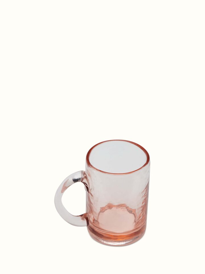 Close-up view of Firozabadi Glass Coffee Mugs in Red (2 pcs), focusing on the intricate glasswork and color