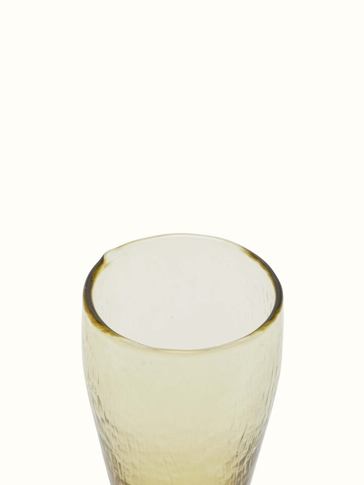 Close-up detail of soda-lime glass-worked beer glasses emphasizing the craftsmanship and fine finish