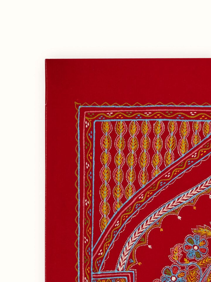 Close-up of Rogan castor oil and pigment Janma painting, featuring intricate designs and rich colors.