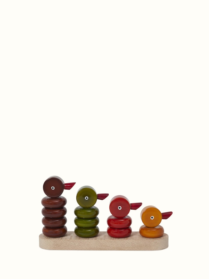 Front view of Channapatna Ivory Wood Stacking Ducks (4 pcs) featuring vibrant colors and craftsmanship