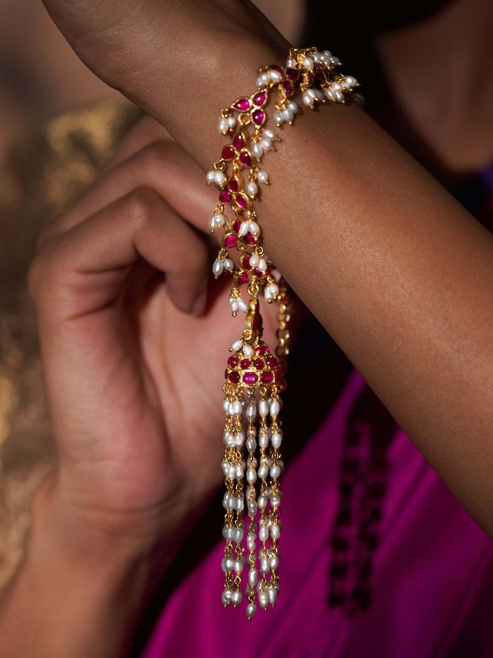 Side view of Guttapusalu Silver Flexible Bracelet highlighting its detailed craftsmanship and elegant flexibility.