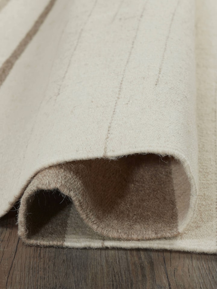 Full view of Nomad Stripes Ivory Beige Jawaja wool & cotton handloom dhurrie highlighting the handloom quality and stripe detail.